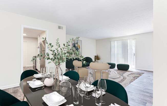 A dining room with a table set for two.