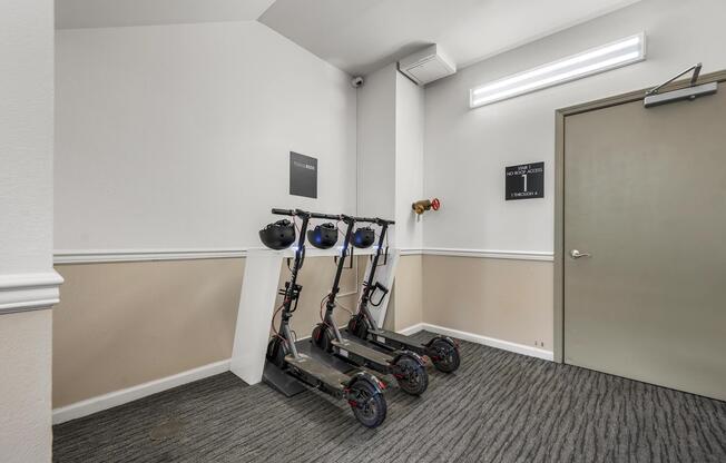 Dedicated scooter storage area with charging capability, offering a convenient solution for storing and powering personal mobility devices.