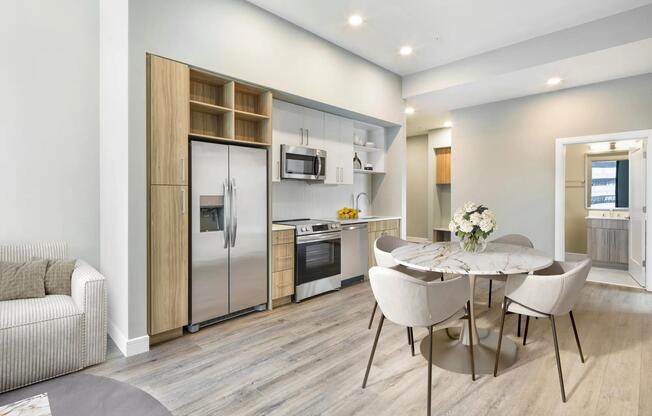 Contemporary kitchens feature stainless steel appliances, quartz countertops, open shelving, and curated finishes designed to suit your lifestyle.