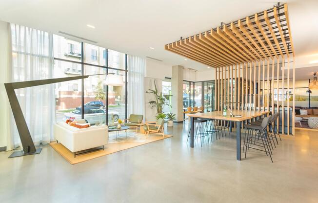 Lounge with work from home conference table and complimentary WiFi.