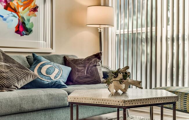 a living room with a couch and a chair