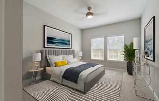 a bedroom with a large bed and two windows