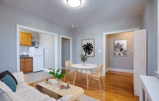 One-bedroom living and dining (virtually staged) at The Melwood, Washington, 20009