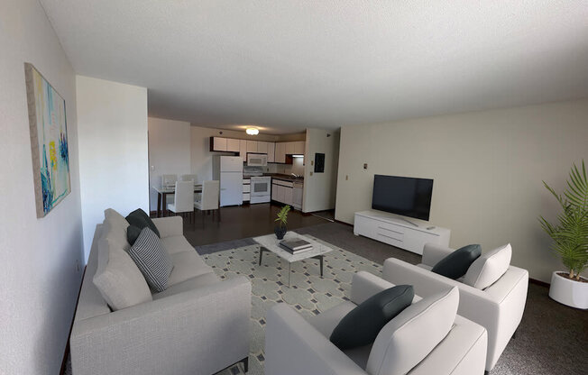 a living room with couches and a coffee table