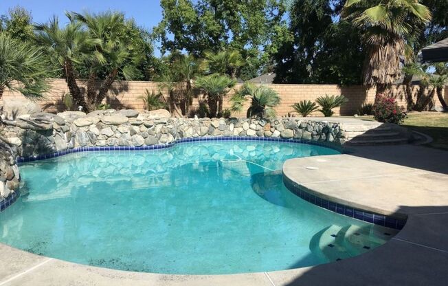 Exquisite Stockdale Estates Sanctuary: Spacious 4-Bedroom Home with Luxurious Pool and Garden