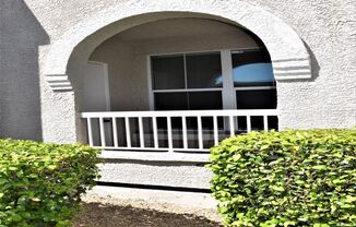 Two bedroom two bathroom ground floor condo in gated Chateau Nouveau with no carpeting!