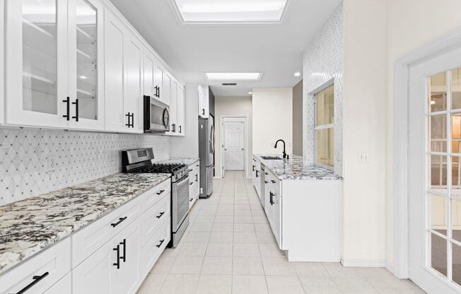 Beautifully renovated 4 bedroom 2 bath in NW Capri Neighborhood