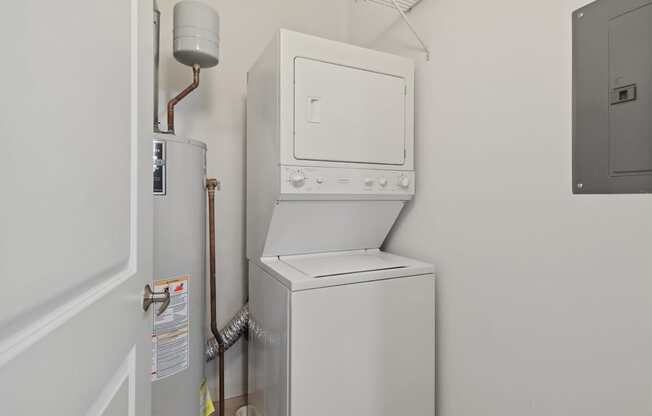 A white oven and fridge in a small kitchen.