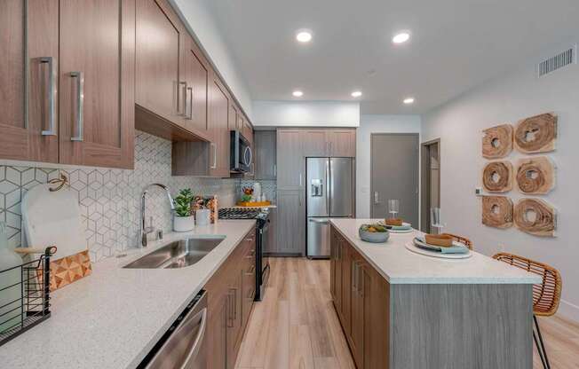 A kitchen with wooden cabinets and a white countertop.