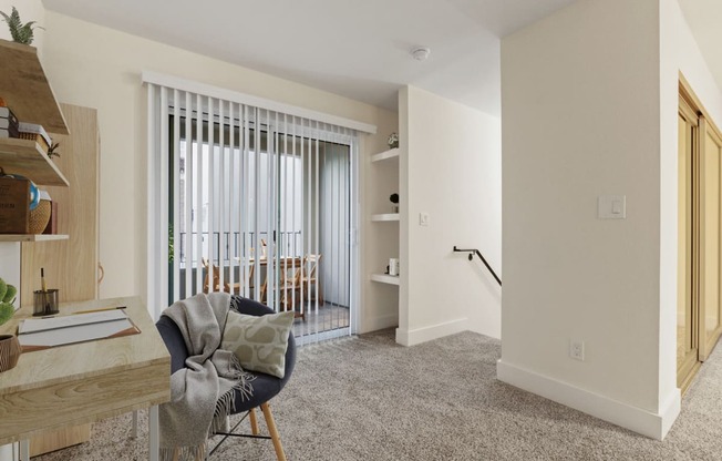 a living room with a couch and a chair and a sliding glass door