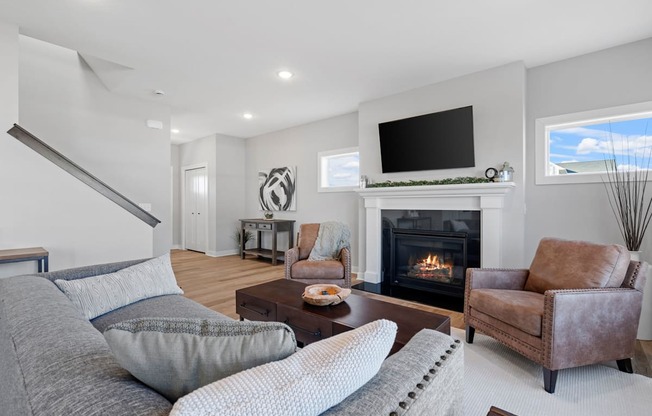 living room with fireplace and mounted tv