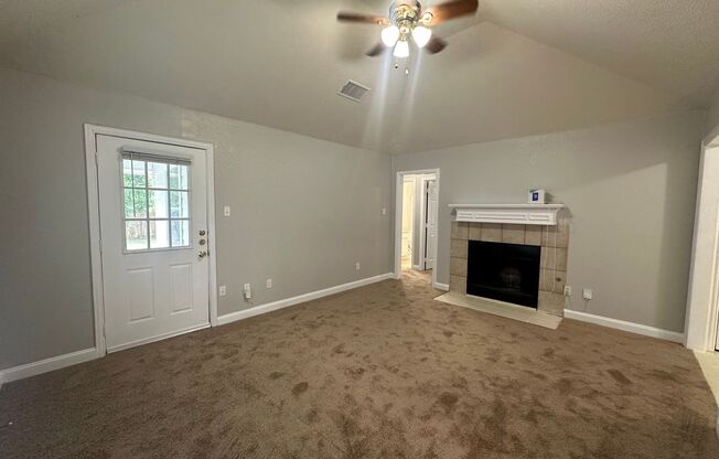 Charming 3-Bedroom Home with Spacious Living & Backyard!