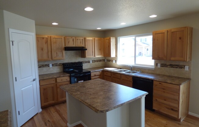 Lovely 2 Story Home in Windsor's Raindance Community! Corner Lot!