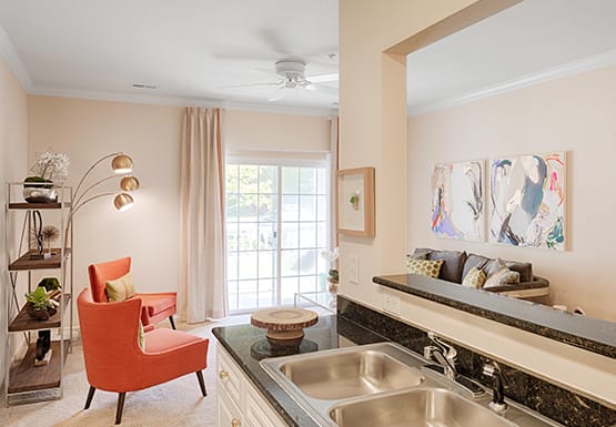 Open floor plan from galley kitchen into living room