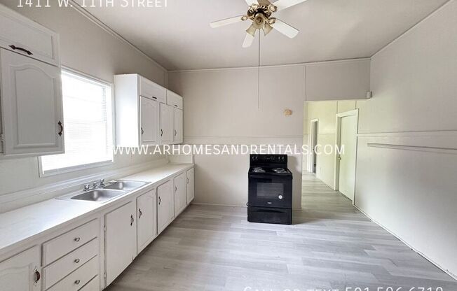 1411 W 11