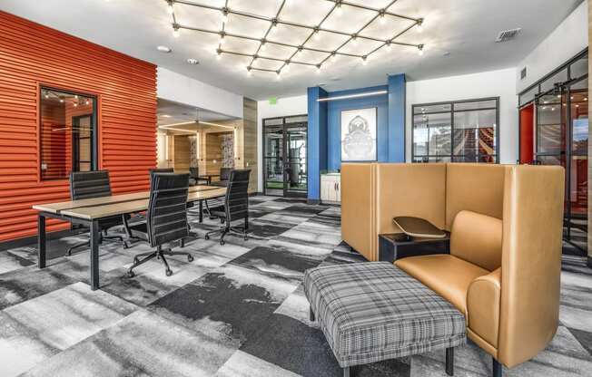 a conference room with chairs and tables and a couch at The Overlook, Winter Garden