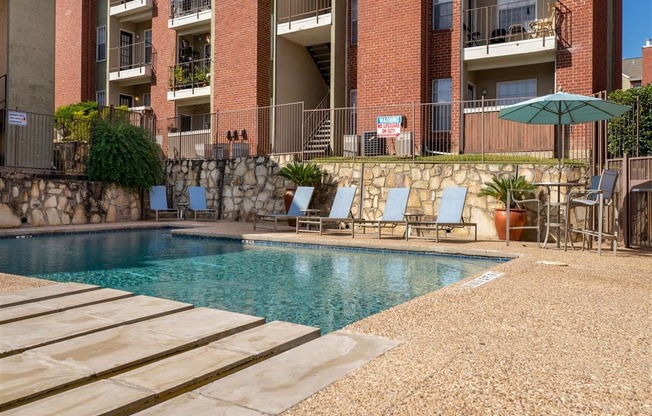 Pool With Sunning Deck at Wildwood Apartments, CLEAR Property Management, Austin, 78752