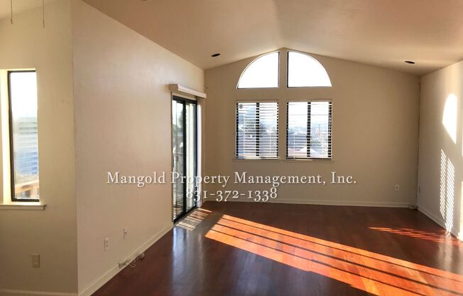 Charming Two-Story 2-Bed 2-Bath Home with Wrap-Around Balcony & Hardwood Floors in Seaside