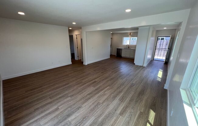 **Newly Renovated 2BDRM/1BTH with in unit laundry, private backyard and two parking spots!!**