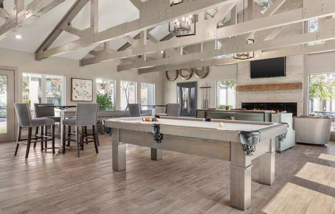 a games room with a pool table in a clubhouse at South Lamar Village, Texas, 78704