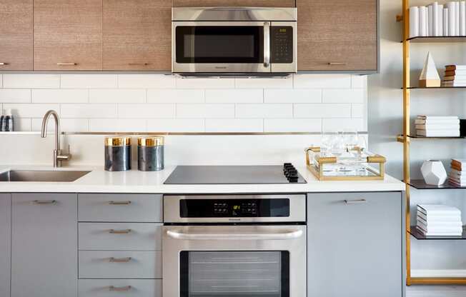 Stainless steel appliances and quartz countertops