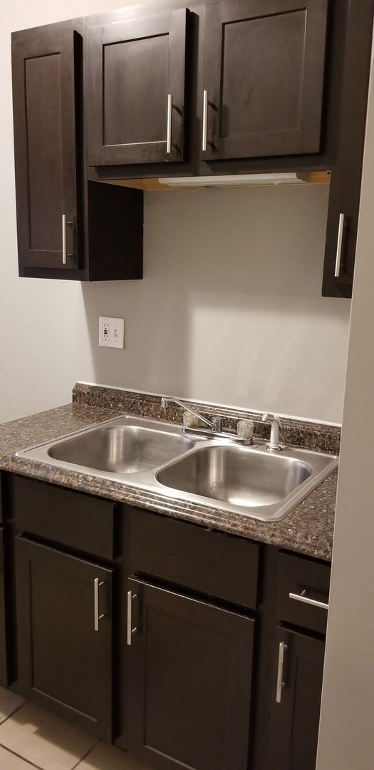 5039 S Champlain Ave / 635-639 E 50th Pl