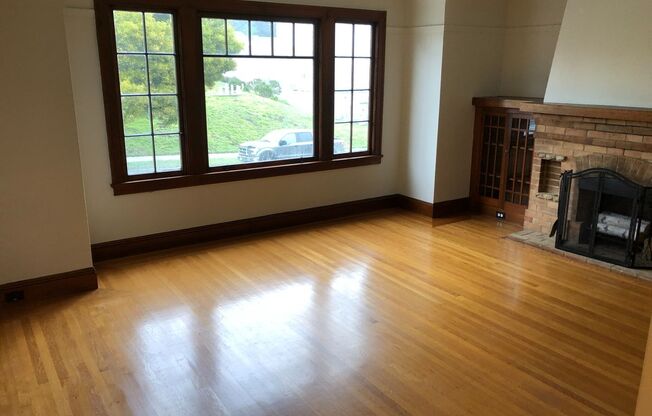 Classic Sunset single family home w/bonus sunroom and dining room for office/nursery with huge yard & garage!