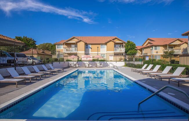 a house with a large pool of water