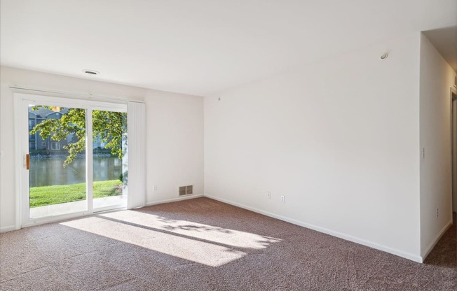 Spacious Living Area with Carpet