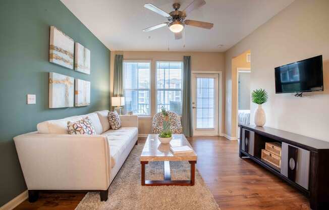 a living room with a couch and a coffee table