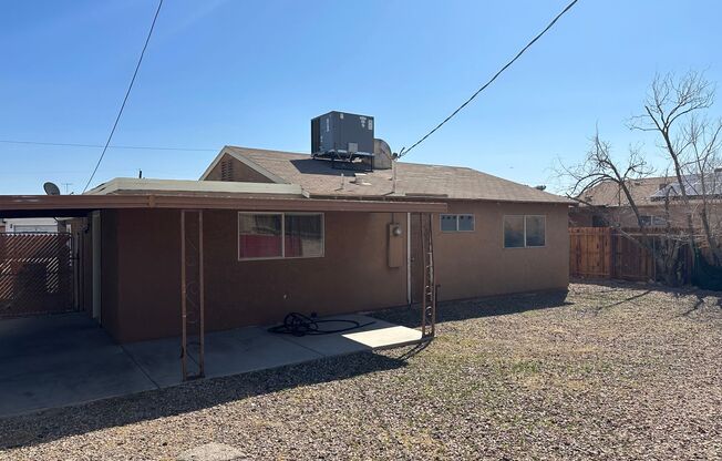 NO HOA!!  Single Story!! 3 bedroom Home!!!, 1 car Carport! Covered Patio in back. New Interior Paint!! New carpet in bedrooms!!