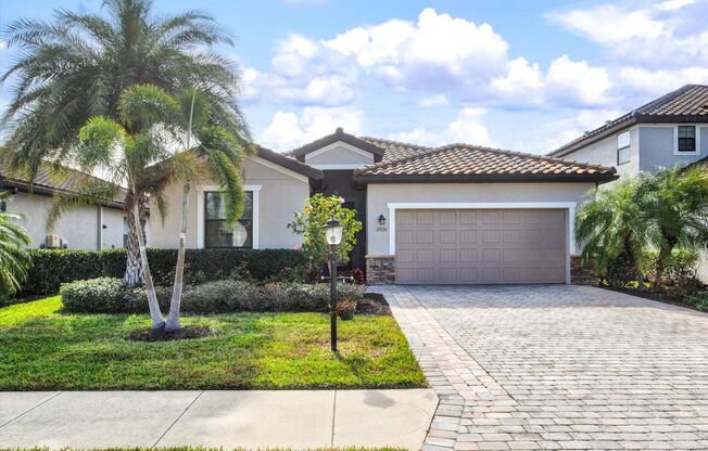 4 Bedroom 3 Bathroom Pool Home with a Pond View in a Gated Community