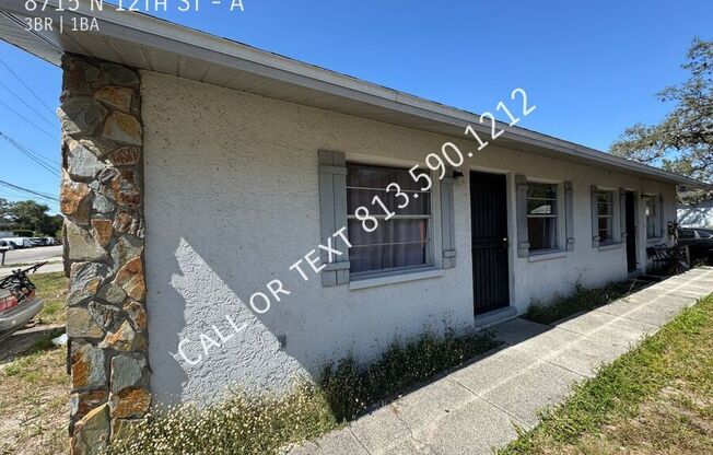 8715 N 12 ST