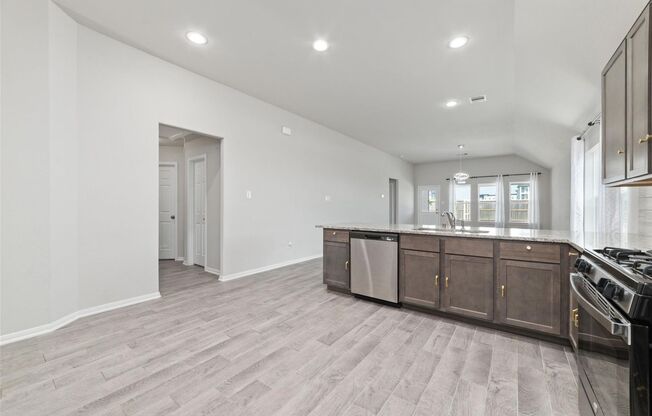 Love every moment spent in this incredible Lake Ridge Builders home in Morton Creek Ranch. Resting on a corner lot, this 3-sided brick home boasts a premium elevation, no back neighbors, wood-look tile flooring, a sprinkler system, faux wood blinds, and a