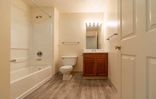 Large Soaking Tub In Master Bathroom With A Tile Surround at Bradford Place Apartments, Lafayette, IN