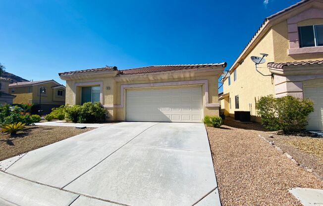 SINGLE STORY HOME INSIDE GUARD GATED RHODES RANCH COMMUNITY WITH FOUR BEDROOMS LOCATED IN A CUL-DE- SAC!