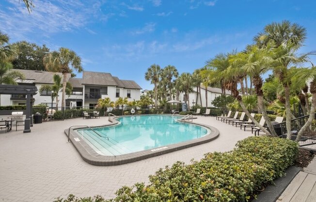 Poolside cabanas and lounge chairs