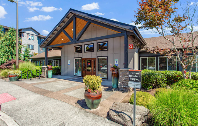 A building with a sign that says "Future Parking" in front of it.