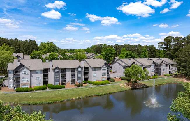 Wesley Place apartment buildings with a pond view