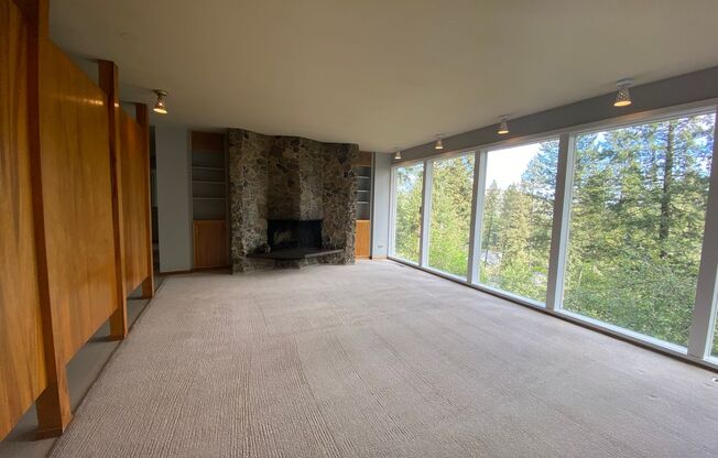 Unique View Property 3 bed, 3 bath located near the Kalispel Golf & Country Club & Whitworth. You must see this one!
