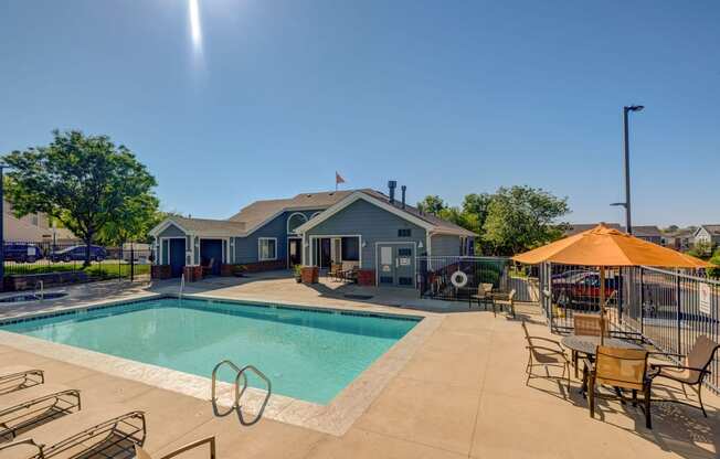 our apartments have a swimming pool and patio with furniture