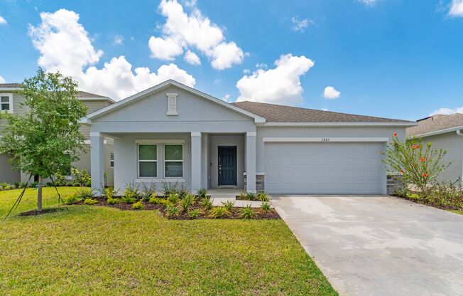 Brand New 4/3.5 Home with Waterview and 2-Car Garage in Seasons at Big Sky of Kissimmee