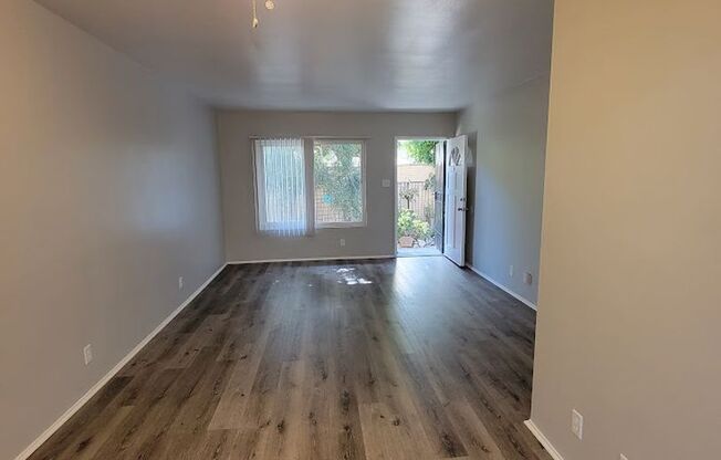 **RENT READY** 1BD/1BA WITH PARKING AND SHARED LAUNDRY WITH MOVE IN SPECIAL