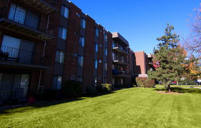 Brick Apartment Building and Landscape at Lansing Riverwood, LLC, Lansing