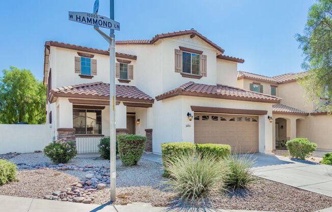 Spacious 4 bedroom home with full bath and bedroom downstairs