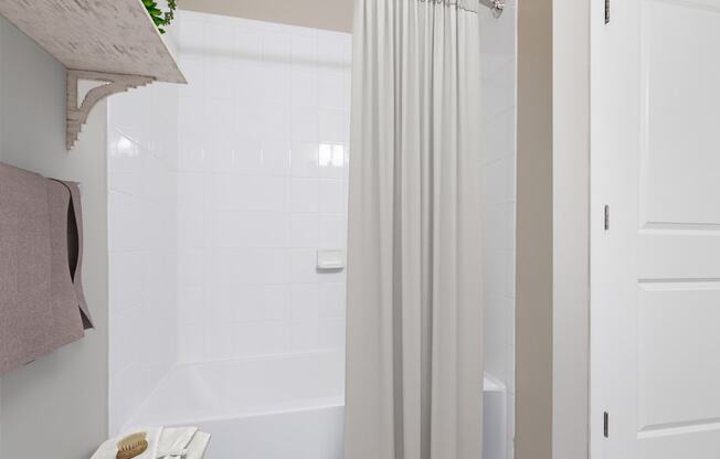 bathroom with tub shower