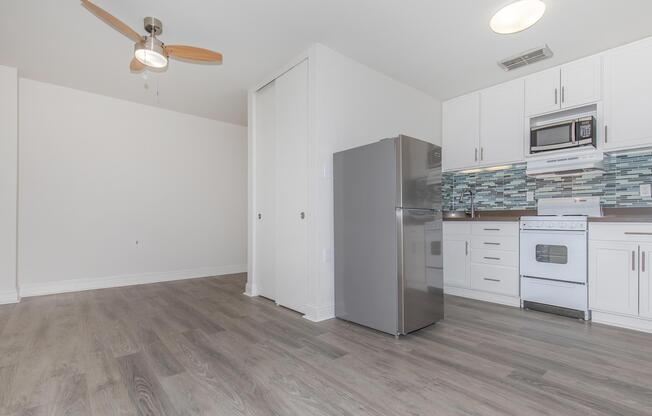 Vacant kitchen with a white oven