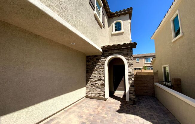 SKYE CANYON 2 STORY WITH PAVER DRIVEWAY AND ENTRY COURTYARD