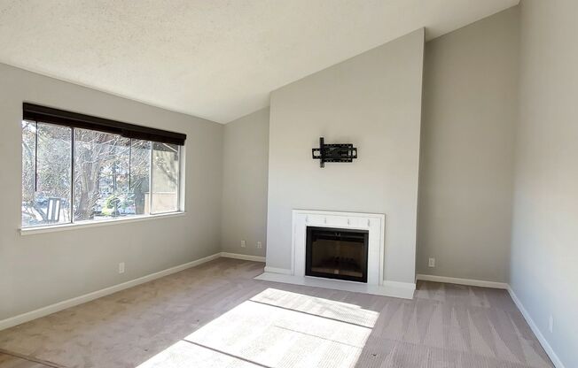 Upstairs Condo with 2 Car Garage, Fresh Paint, Wood Floors, Large Patio, Pool!