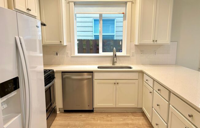 Spacious Mill Park 2-Level Single Family Home with Fenced Backyard